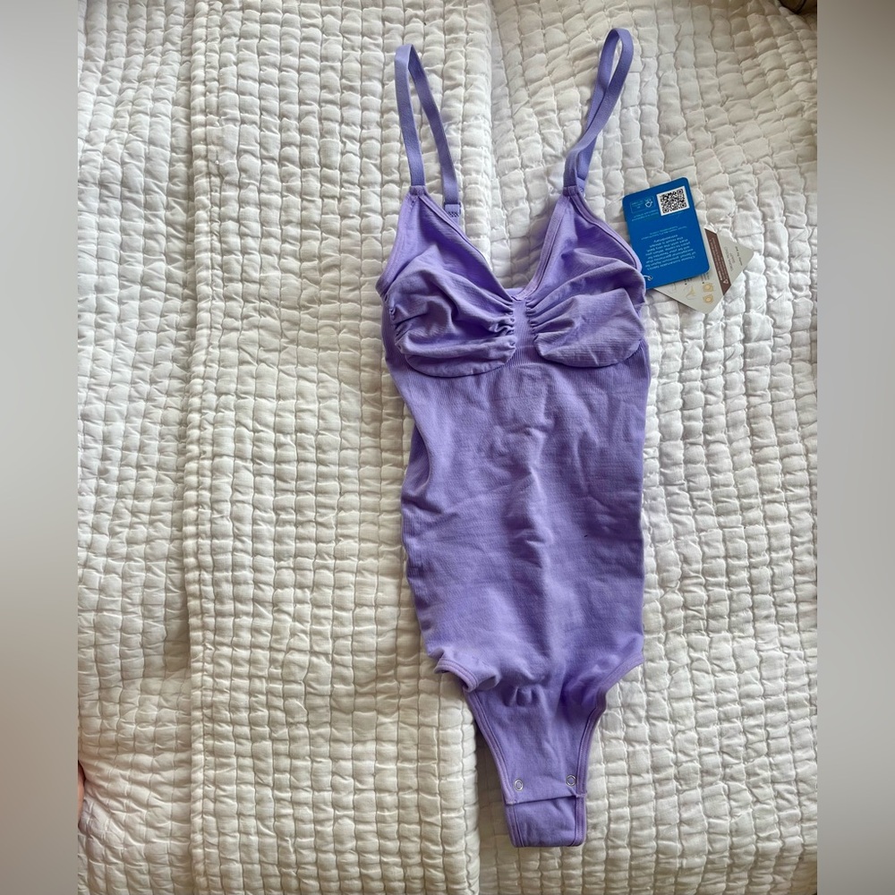 Purple body suit never worn